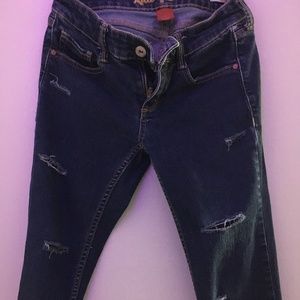 Arizona Jeans. Dark blue with rips for style.